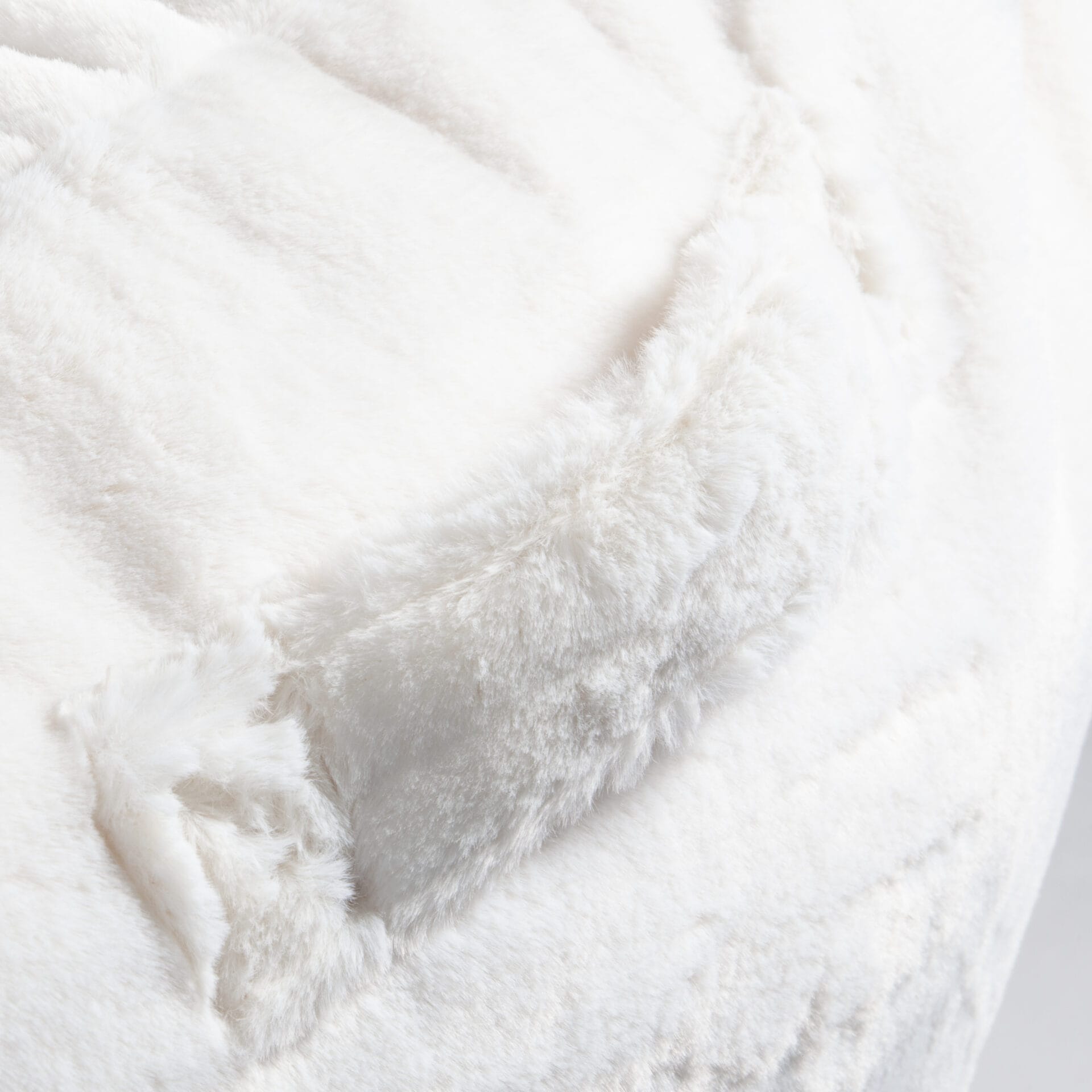 Fauteuil Pouf Bari fausse fourrure Ivoire